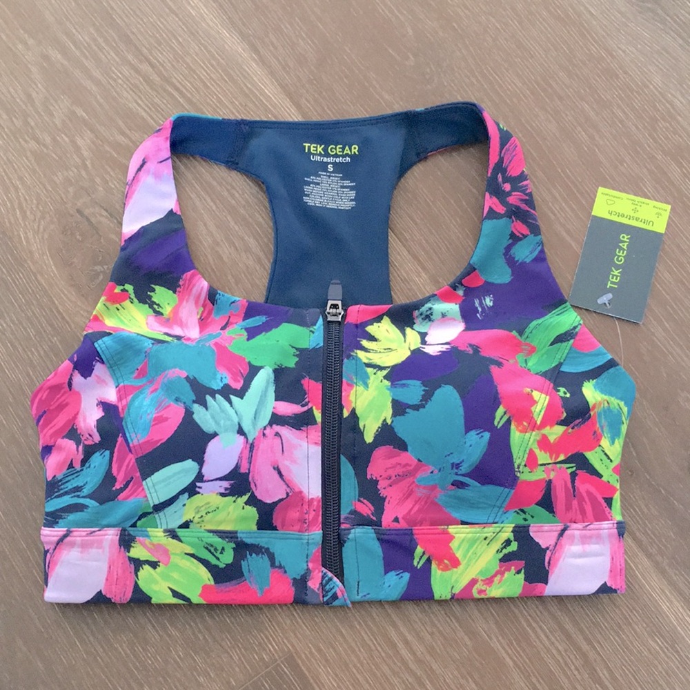 NWT! TEK GEAR ultra stretch floral sports bra. Zippered front. Size small.